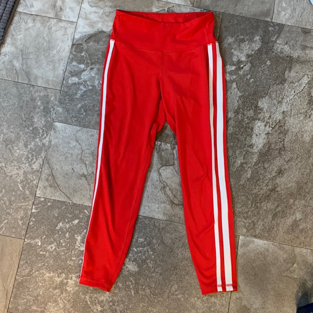 Red leggings with white stripes